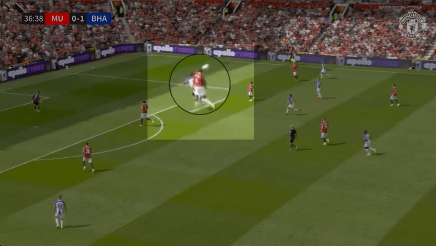 FREEZE-FRAME OF LISANDRO WINNING A CONTESTED AERIAL OPPORTUNITY